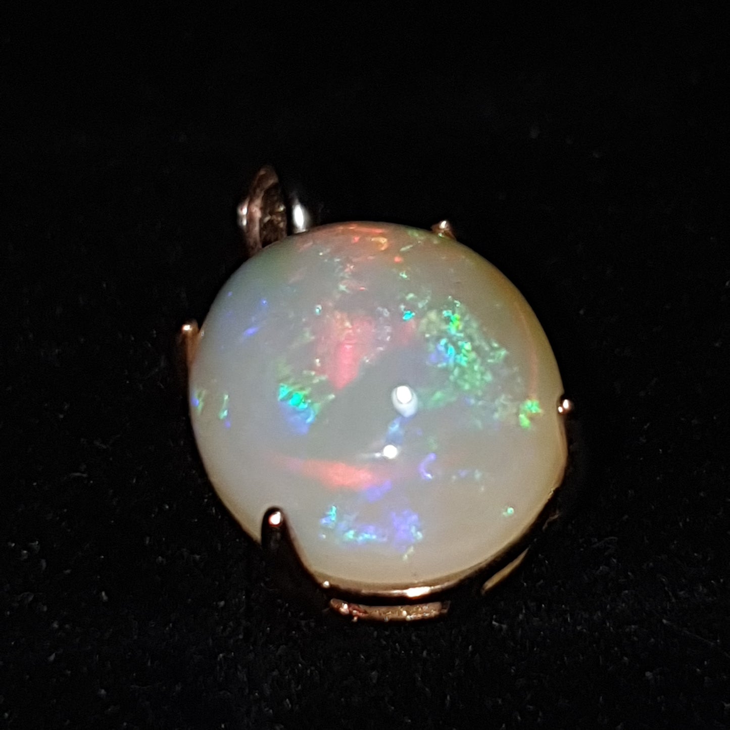 Un pendentif en argent s925 doré or rose 14k et opale cristal welo non traitée de 5.30 carats