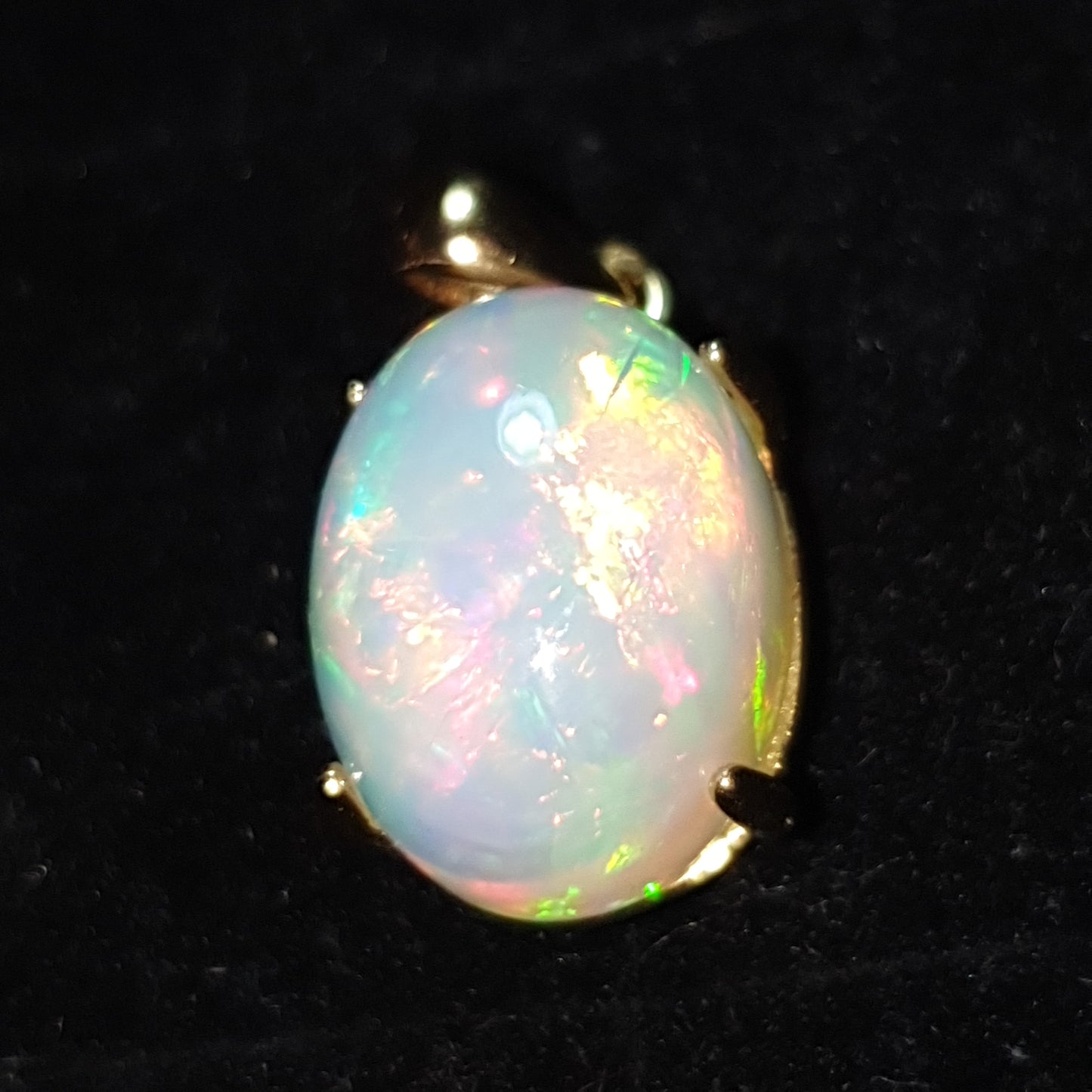 Pendentif en argent s925 doré à l'or jaune 14k opale welo arc en ciel de 6.65 carats