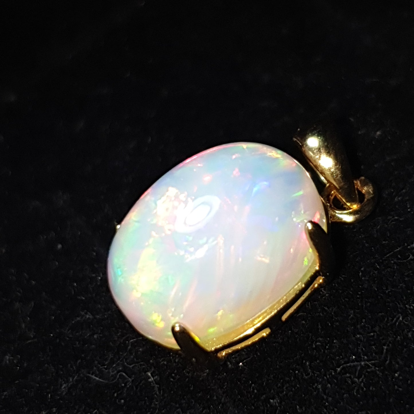 Pendentif en argent s925 doré à l'or jaune 14k opale welo arc en ciel de 6.65 carats