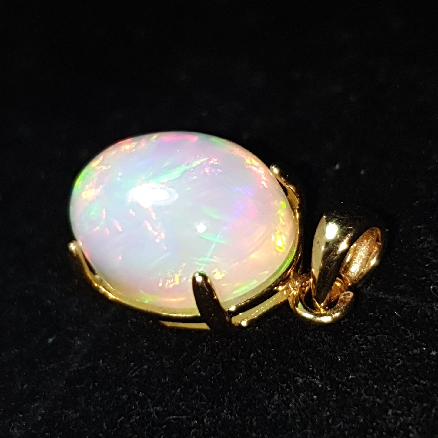 Pendentif en argent s925 doré à l'or jaune 14k opale welo arc en ciel de 6.65 carats