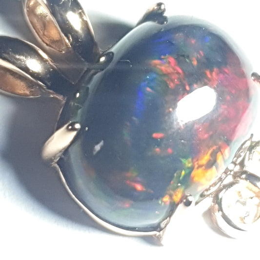 Pendentif argent S925 dore à l'or rose et opale welo noire de 6.2 carats